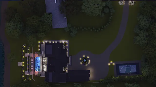 Night aerial rendering of the property with the drive, fountain court and sport court lit