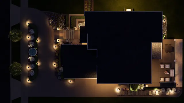Night plan view rendering of the paved drive, the planting island and the rear terrace lit