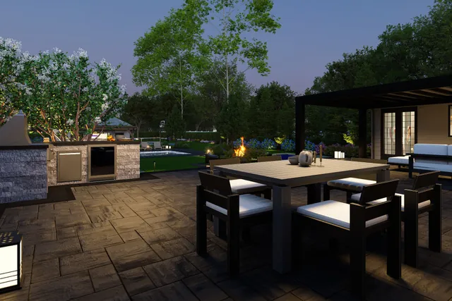 Dusk rendering of the outdoor kitchen and pergola dining terrace
