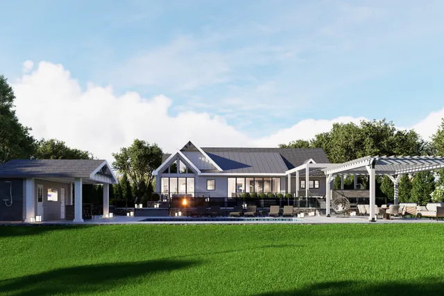 Dusk rendering of the rear elevation across the lawn